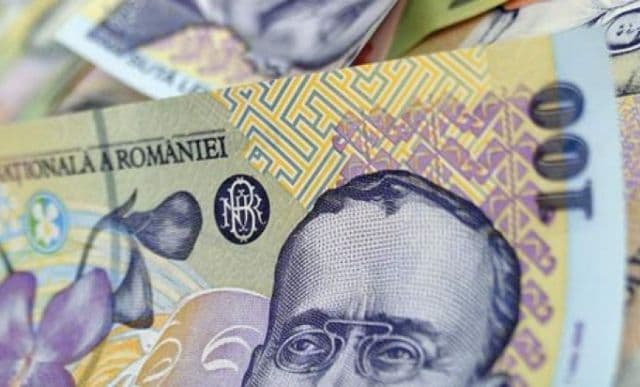 ATENŢIE! Bancnote de 100 de lei, false. Percheziţii în trei județe