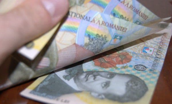 Salariul minim creste la 1.250 lei de la 1 mai