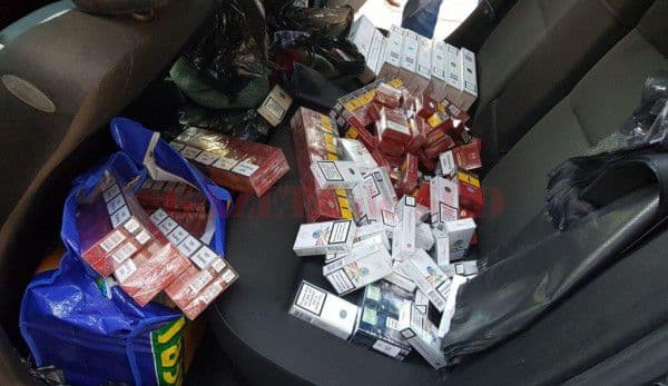 Marfă confiscată, mașină reținută și dosar penal pentru contrabandă cu ţigări