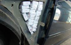  Încă o inovație a contrabandiștilor! Ţigarete ascunse în aripile unui autoturism! - FOTO
