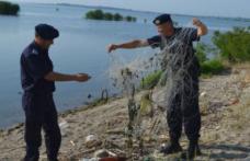 Bărbaţi prinşi de jandarmi la braconaj piscicol pe acumularea Bucecea