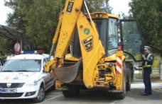 Botoșănean depistat timp ce conducea un buldoexcavator fără a poseda permis de conducere