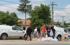 Voluntarii E.ON au ajutat familiile afectate de inundaţiile din judeţul Bacău - FOTO