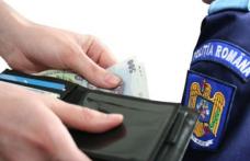 Un poliţist prins în timp ce lua mită de la un șofer