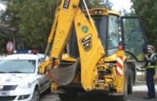 Buldoexcavator condus de un tânăr fără permis pe străzile din Botoșani