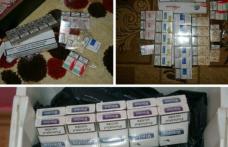 Ţigarete confiscate de poliţişti, în urma unor percheziţii domiciliare