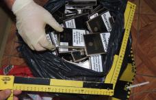 Percheziţii la persoane bănuite de contrabandă cu ţigarete - FOTO