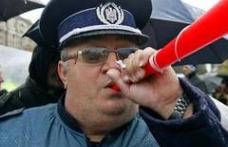 Propunere legislativă: Poliţiştii burtoşi să fie concediaţi