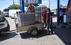 Unităţile administrativ-teritoriale afectate de inundaţii şi-au preluat combustibilul pentru reparaţiile de urgenţă - FOTO