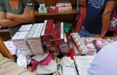 Tupeu de comerciant! Prinși în timp ce vindeau țigări de contrabandă pe sub tejghea