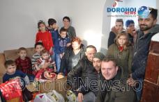 Gest emoționant în prag de Crăciun: Un grup de dorohoieni a adus zâmbete pe chipurile unei familii - FOTO