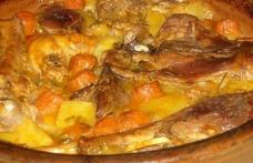 Carne de curcan pe pat de cartofi