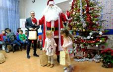Moș Crăciun a oferit cadouri la sediul PSD Botoșani - FOTO