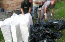 Șapte colete cu ţigări găsite într-o locuinţă părăsită