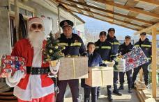 Pompierii de la Stația Săveni au adus bucurie pentru patru frați, asigurându-se că Moș Crăciun nu îi va ocoli - FOTO