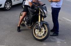 Motocicletă cu numere false depistată în trafic
