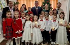 Tradiție și colinde: Copiii din Ibănești au adus bucuria Nașterii Domnului la Primărie! - FOTO