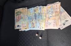 Barbut în plină stradă oprit de jandarmii botoșăneni. Amenzi și zaruri confiscate