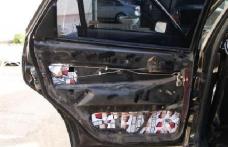 Portiere de Audi căptuşite cu ţigări de contrabandă