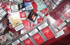 Femeie prinsă de jandarmi în timp ce îşi ascundea sub haine 138 pachete de ţigări de contrabandă