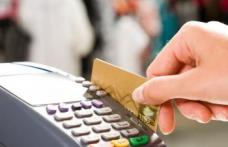 Sute de români au conturile goale, după ce au plătit la POS-urile Raiffeisen