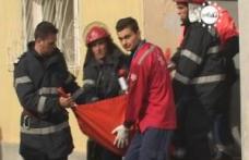 Femeie salvată de pompieri în ultima clipă 