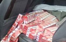 Au fugit de poliţişti pentru că aveau maşina burduşită cu aproape 10.000 de pachete de ţigări