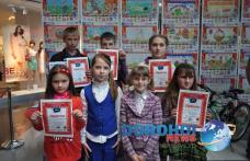 Opt elevi din Dorohoi premiați la concursul de desene organizat de Carrefour - VIDEO/FOTO