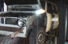Proprietar de service auto cercetat pentru repararea unui autovehicul fără documente de constatare eliberate de poliţie