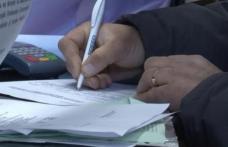 Femeie cercetată pentru înșelăciune şi fals în înscrisuri sub semnătură privată