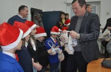 Consilierii locali dorohoieni au fost colindați la ultima ședință din anul 2014 – VIDEO/FOTO