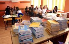 Manualele vândute cu de-a sila le pot aduce dascălilor 10 ani de închisoare