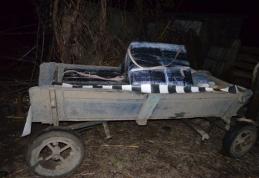 Doi cetăţeni care transportau 4900 pachete de ţigări într-o caruţă sunt cercetaţi pentru contrabandă - FOTO