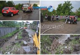 Gospodării și beciuri inundate după o ploaie torențială la Dorohoi: Intervenție în forță a pompierilor - FOTO