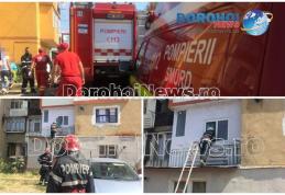 Intervenție a pompierilor! Femeie baricadată cu propriul copil într-un apartament din Dorohoi - FOTO