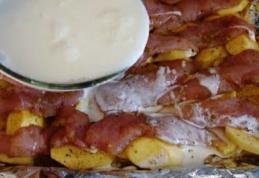 Pui la cuptor pe pat de cartofi