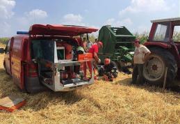 Un bărbat din Darabani este în stare critică după ce a fost strivit de o balotieră