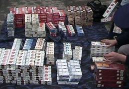 Percheziții domiciliare la persoane bănuite de contrabandă cu țigări 