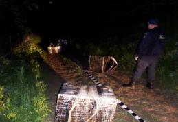 Focuri de armă si 18.000 de pachete cu ţigări de contrabandă confiscate de poliţiştii de frontieră - FOTO