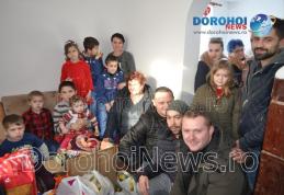 Gest emoționant în prag de Crăciun: Un grup de dorohoieni a adus zâmbete pe chipurile unei familii - FOTO