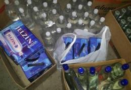Băuturi alcoolice și țigări de contrabandă confiscate după o acțiune a polițiștilor la Săveni