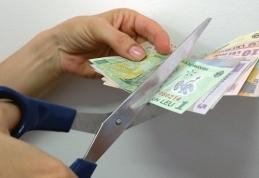 Au venit primele tăieri de salarii, în ajun de Sărbători