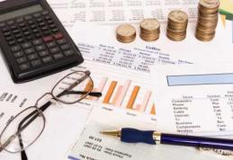 Parlamentul a adoptat OUG care prevede bonificații pentru firmele care își plătesc impozitele