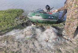 Sute de metri de plase pentru pescuit, amplasate ilegal scoase de Jandarmi din râul Prut - FOTO