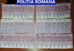 Bărbat reținut pentru punerea în circulație de monedă străină falsificată și înșelăciune