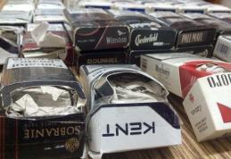 Femeie prinsă că vindea pachete de țigări de contrabandă, pline cu bucăți de carton în apropierea Pieței din Dorohoi