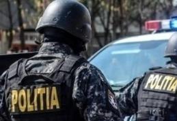 Percheziție domiciliară în județ. Zeci de cartușe identificate și ridicate de polițiști