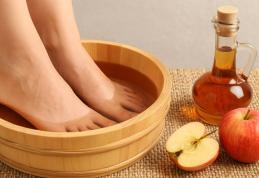 Cum ne ajută o baie la picioare cu oțet de mere?