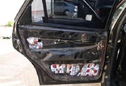 Portiere de Audi căptuşite cu ţigări de contrabandă