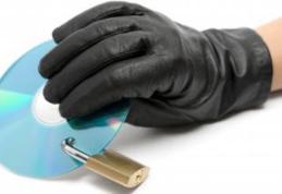 Doi români condamnaţi pentru grave infracţiuni de piraterie informatică